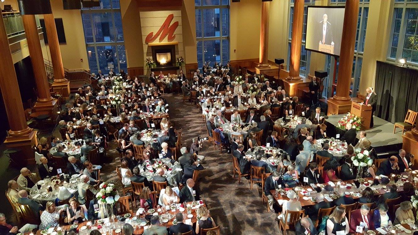 People fill a Wood Dining Commons for a formal event.